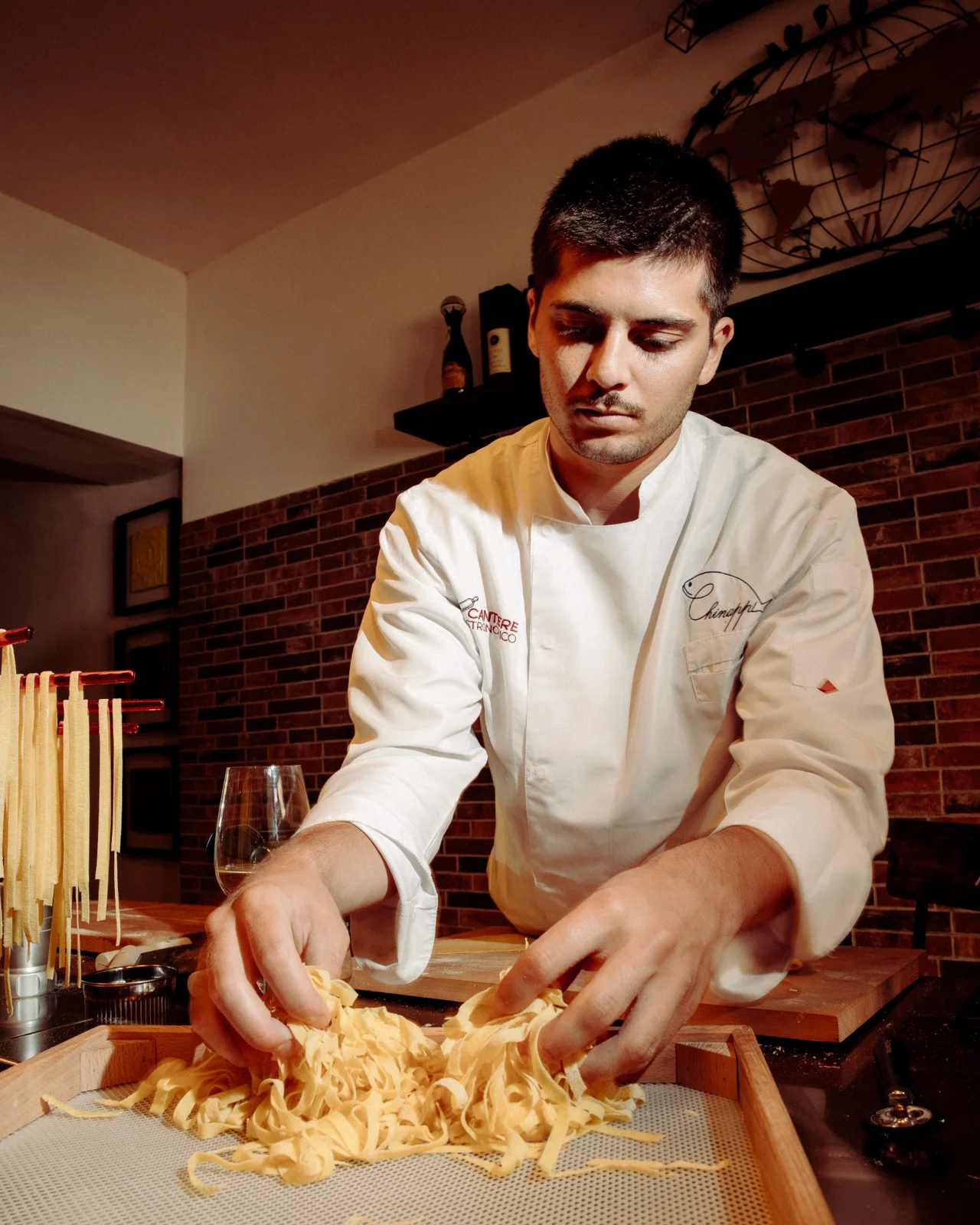 Chef working with fresh pasta in the studio